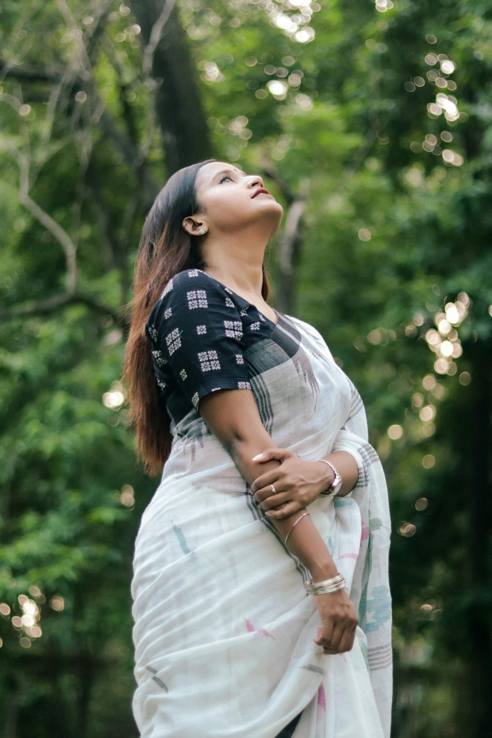 A woman in a traditional saree in Kollam Wedding Dress Shop
