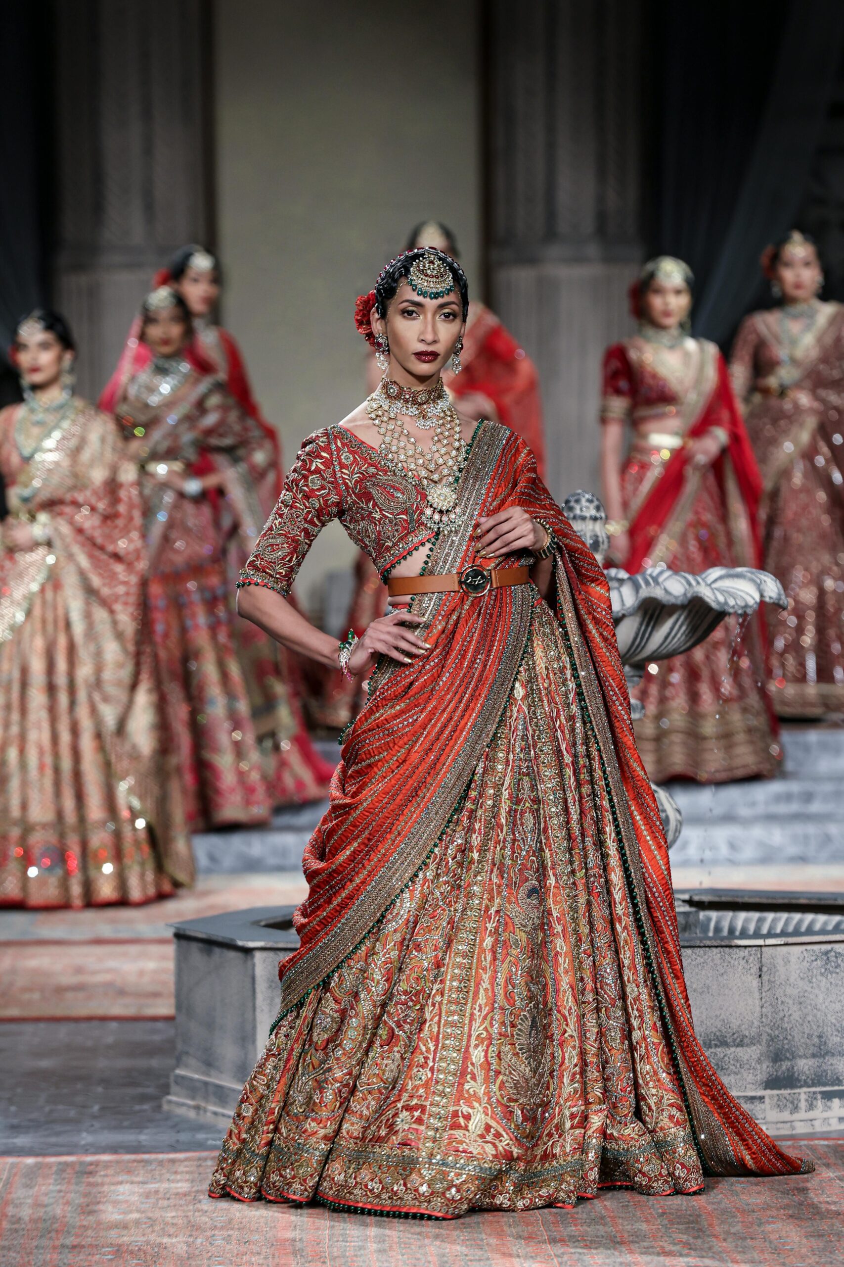 Stunning Indian model showcasing traditional attire at a New Delhi fashion show.